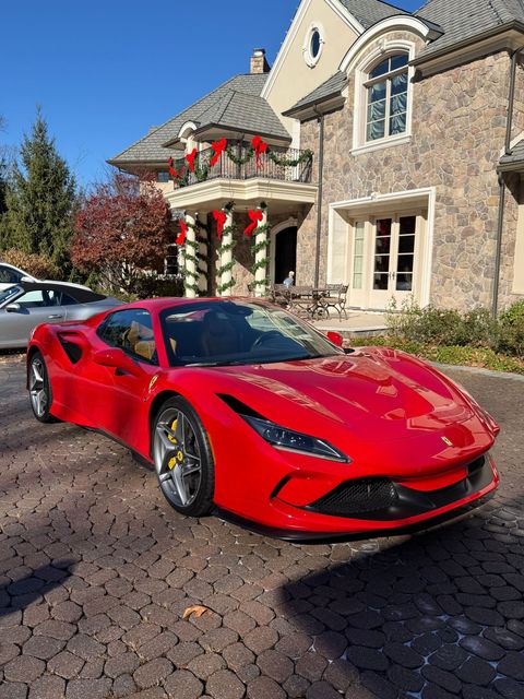 A red sports car featured on OnPoint’s ceramic coating page